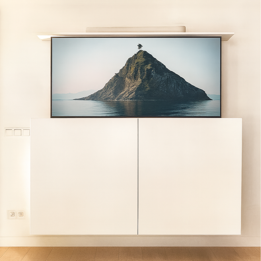 TV mounted on a wall displaying an island scene, below a white cabinet.